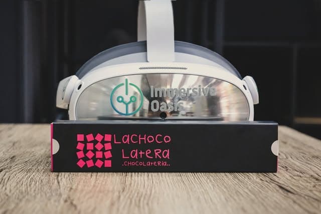VR headset with Lachoco Latera box on a wooden table