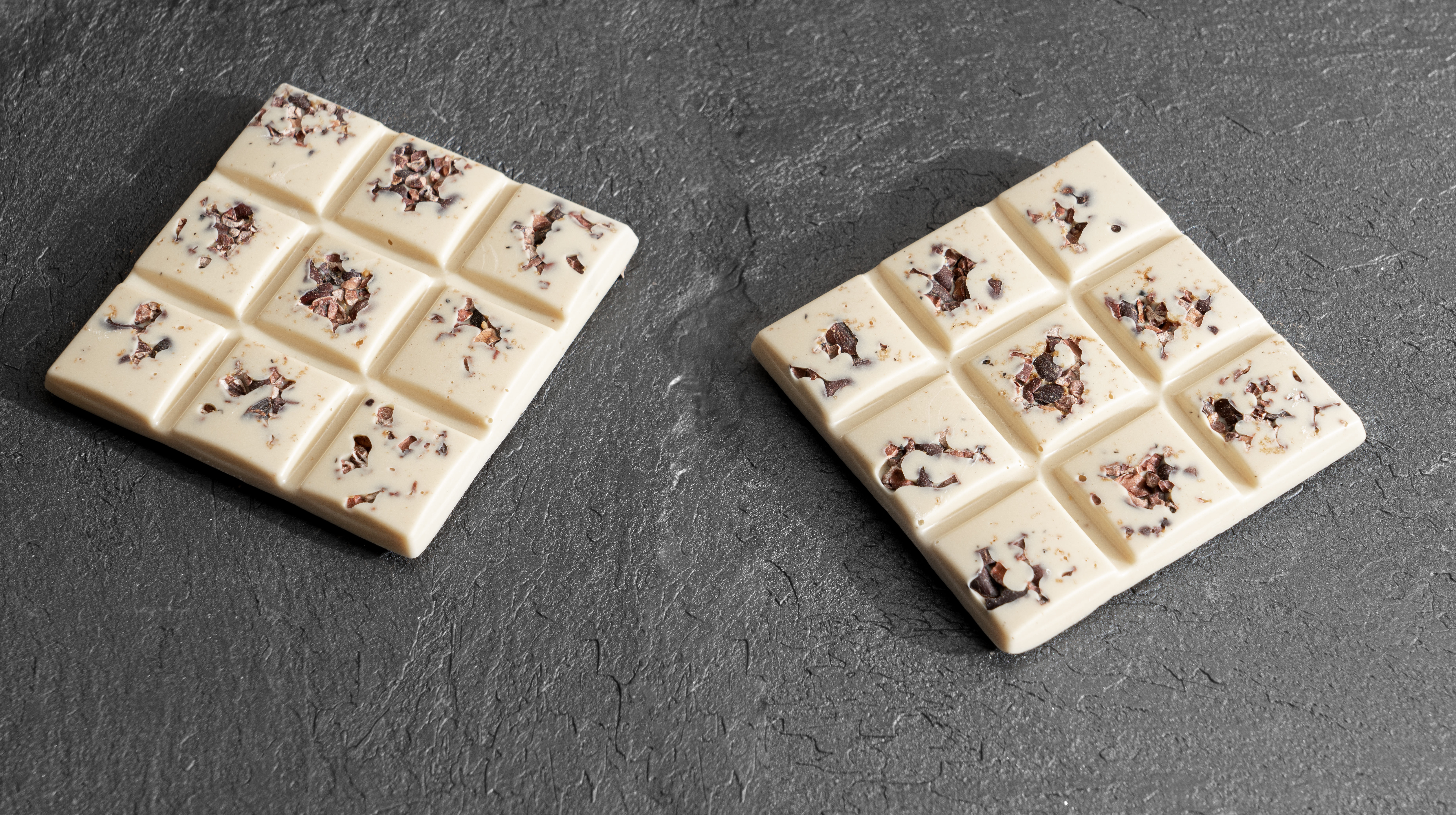 White chocolate bar with cacao nibs and tonka bean
